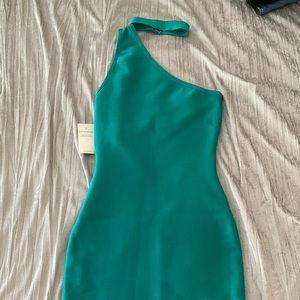 Brand new with tags, woman’s green body con stretchy, one shoulder dress